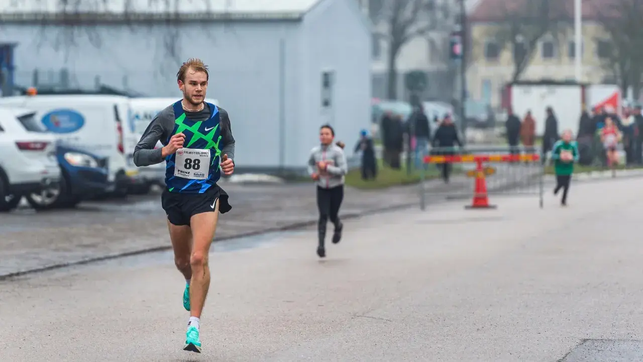 Runner with bib number 88 in a race.